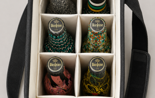 Open-top cool bag containing six Warsteiner ‘Artist’ bottles